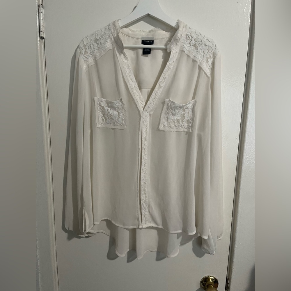 A white light weight shirt from torrid